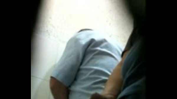 4280549 two men jerking in toilet