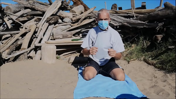 naked uncut slave exposed striptease at gay beach collared in penis cage fuck with cucumber BDSM CBT